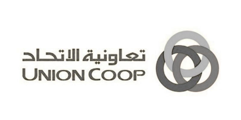Union Coop logo with Arabic text on a white background